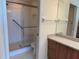 Clean bathroom with shower, toilet and wood vanity at 8001 Sailboat Key S Blvd # 202, St Pete Beach, FL 33707