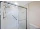 Bathroom with shower and grab bar at 8001 Sailboat Key S Blvd # 202, St Pete Beach, FL 33707