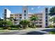 Attractive building exterior with landscaping at 8001 Sailboat Key S Blvd # 202, St Pete Beach, FL 33707