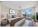 Main bedroom with water view and balcony access at 8001 Sailboat Key S Blvd # 202, St Pete Beach, FL 33707