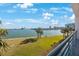 Expansive waterfront view with palm trees at 8001 Sailboat Key S Blvd # 202, St Pete Beach, FL 33707