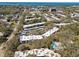 Aerial view of community showing building and surroundings at 831 Maple Ct # 303, Dunedin, FL 34698