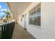 Clean condo hallway with light-colored walls and flooring at 831 Maple Ct # 303, Dunedin, FL 34698
