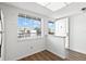 Bright condo kitchen with new flooring and window at 831 Maple Ct # 303, Dunedin, FL 34698