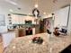 Modern kitchen with stainless steel appliances and granite countertops at 8616 Pinafore Dr, New Port Richey, FL 34653