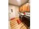 Laundry room with washer, dryer, and ample cabinet space at 8616 Pinafore Dr, New Port Richey, FL 34653