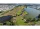 Aerial view of golf course with lake at 9135 36Th N Way, Pinellas Park, FL 33782