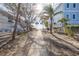 Walkway to beach through lush tropical vegetation at 104 159Th Ave, Redington Beach, FL 33708
