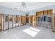 Large bedroom under renovation, features tiled floor at 104 159Th Ave, Redington Beach, FL 33708