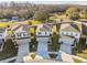 Aerial view of three-bedroom homes with two-car garages at 10711 Old Sycamore Loop, Land O Lakes, FL 34638