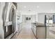 Modern kitchen with stainless steel appliances and granite countertops at 10711 Old Sycamore Loop, Land O Lakes, FL 34638