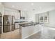 Modern kitchen with stainless steel appliances and granite countertops at 10711 Old Sycamore Loop, Land O Lakes, FL 34638