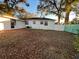 Backyard view of house with detached building at 1308 E Caracas St, Tampa, FL 33603