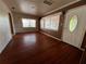 Living room with hardwood floors and brown walls at 1308 E Caracas St, Tampa, FL 33603