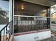 Screened porch with ornate railing and wood ceiling at 1308 E Caracas St, Tampa, FL 33603