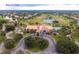 Aerial view of Bayou Club with pool and driving range at 1401 Cordova Grn, Seminole, FL 33777