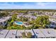 Aerial view of community, highlighting the pool and building layout at 1401 Cordova Grn, Seminole, FL 33777