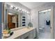 Bathroom with double vanity and walk-in shower at 1401 Cordova Grn, Seminole, FL 33777