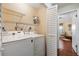 Bright laundry room with Samsung washer and dryer at 1401 Cordova Grn, Seminole, FL 33777