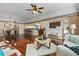 Open concept living area with a view of the kitchen and dining areas at 1401 Cordova Grn, Seminole, FL 33777