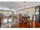 Spacious living room with hardwood floors, large windows, and comfortable seating at 1401 Cordova Grn, Seminole, FL 33777