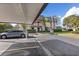 Covered parking space near the building entrance at 1401 Cordova Grn, Seminole, FL 33777