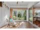 Peaceful sunroom with terracotta flooring and access to the outdoors at 1401 Cordova Grn, Seminole, FL 33777