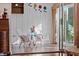 Bright and airy sunroom, perfect for relaxing, with terracotta tile flooring at 1401 Cordova Grn, Seminole, FL 33777