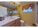 Bathroom with updated vanity and a shower/tub combo at 15731 Crystal Waters Dr, Wimauma, FL 33598