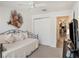 Bedroom with daybed, window, and closet at 15731 Crystal Waters Dr, Wimauma, FL 33598