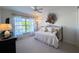 Cozy bedroom with daybed and large window at 15731 Crystal Waters Dr, Wimauma, FL 33598