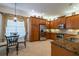 Spacious kitchen with stainless steel appliances and granite countertops at 15731 Crystal Waters Dr, Wimauma, FL 33598