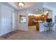 Kitchen with island, wood cabinets, and breakfast bar at 15731 Crystal Waters Dr, Wimauma, FL 33598