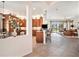 Open kitchen with island and view to living room at 15731 Crystal Waters Dr, Wimauma, FL 33598