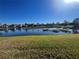 Scenic view of a lake in a residential community at 15731 Crystal Waters Dr, Wimauma, FL 33598
