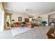 Relaxing living room with leather sofas and view to patio at 15731 Crystal Waters Dr, Wimauma, FL 33598
