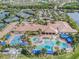 Resort-style pool and clubhouse with surrounding amenities at 15731 Crystal Waters Dr, Wimauma, FL 33598