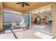 Relaxing screened porch with brick pavers and view of living area at 15731 Crystal Waters Dr, Wimauma, FL 33598