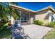Enjoy this screened patio with a view of the lake at 15731 Crystal Waters Dr, Wimauma, FL 33598