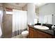 Clean bathroom with shower and granite vanity at 1655 Canopy Oaks Blvd, Palm Harbor, FL 34683