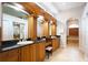 Luxurious bathroom with double vanity and soaking tub at 1655 Canopy Oaks Blvd, Palm Harbor, FL 34683