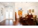 Elegant dining room with hardwood floors and chandelier at 1655 Canopy Oaks Blvd, Palm Harbor, FL 34683