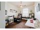 Home office features a large window and ample workspace at 1655 Canopy Oaks Blvd, Palm Harbor, FL 34683