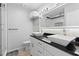 Elegant bathroom with double sinks and a walk-in shower at 17706 1St E St, Redington Shores, FL 33708