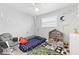 bedroom with playful decor, twin bed, and toy storage at 17706 1St E St, Redington Shores, FL 33708