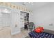 Charming bedroom with closet and comfortable seating at 17706 1St E St, Redington Shores, FL 33708