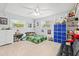 bedroom with video game theme, twin bed, and ample storage at 17706 1St E St, Redington Shores, FL 33708