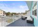 Deck with a sectional sofa and coffee table at 17706 1St E St, Redington Shores, FL 33708