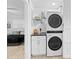 Convenient laundry room with stackable washer and dryer at 17706 1St E St, Redington Shores, FL 33708