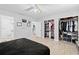 Main bedroom with a large closet and access to the bathroom at 17706 1St E St, Redington Shores, FL 33708